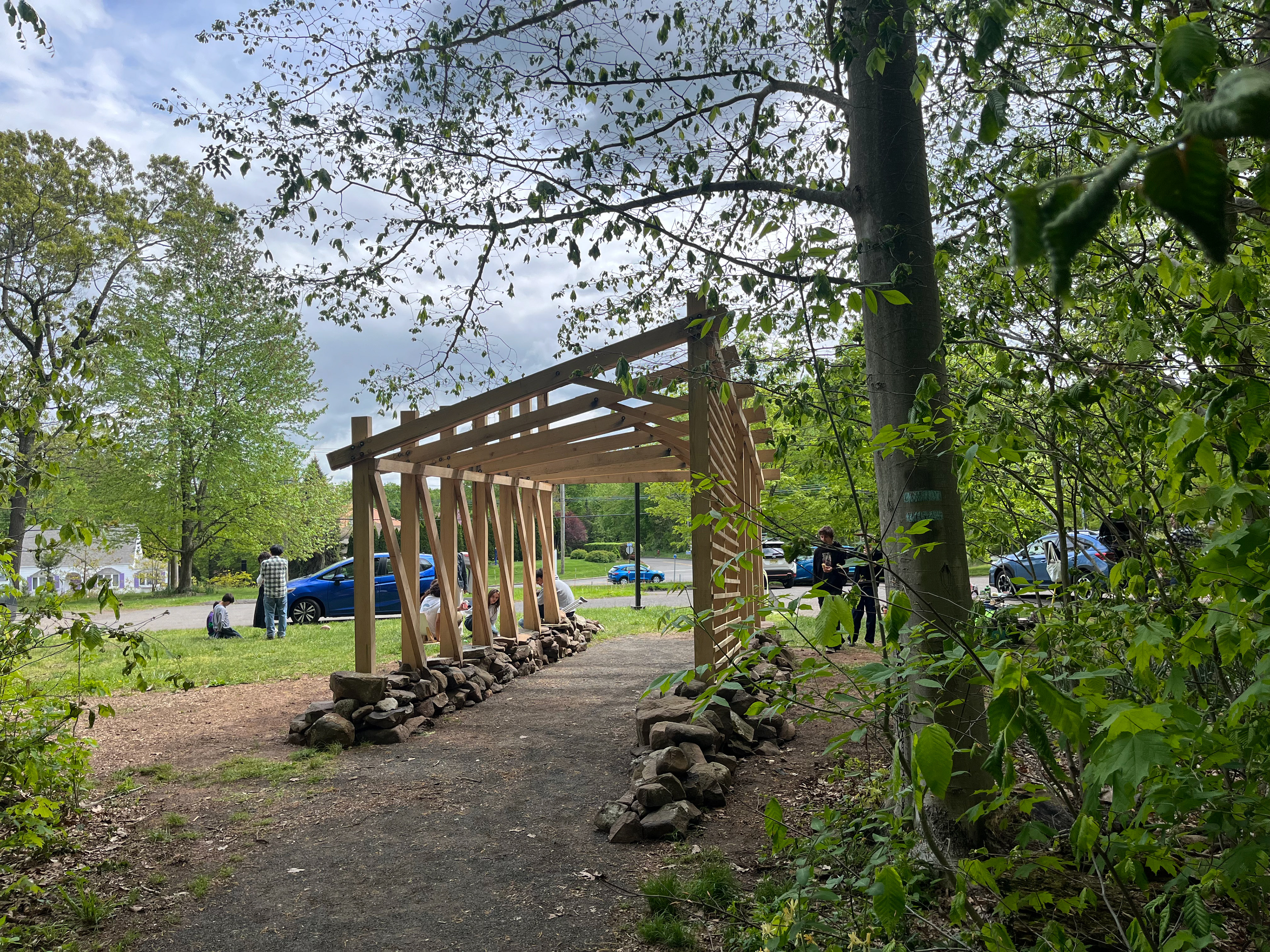 Forest Threshold — completed timber gateway framing the forest trailhead